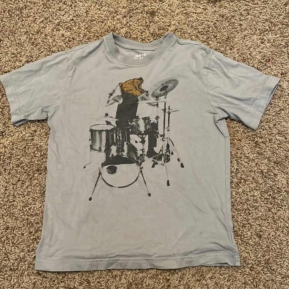 Boys T shirt. Bear head on person playing drums.